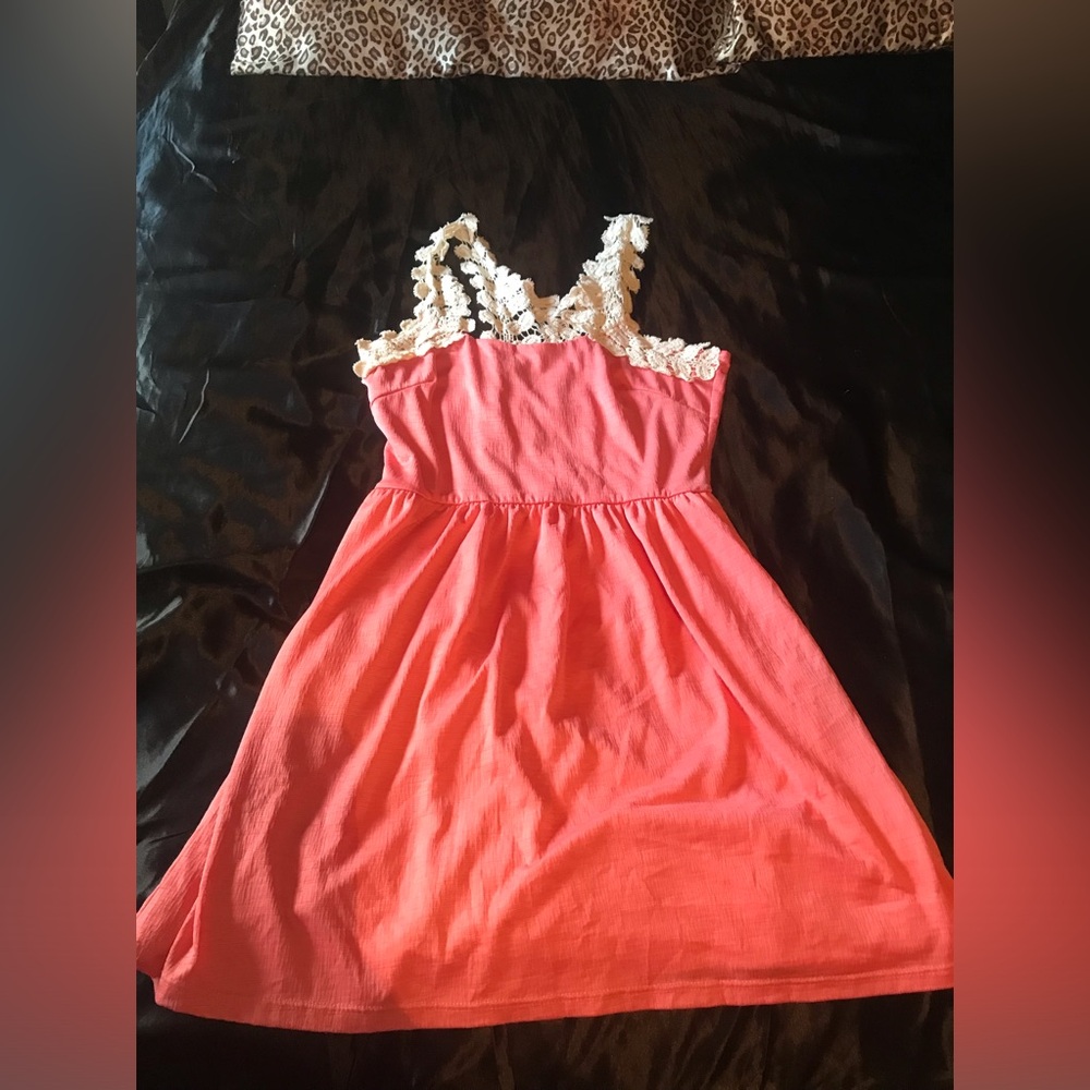 Cute dress size small. Trimmed in cream.